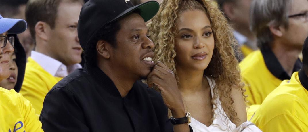 H Jay-Z και η Beyonce στο γήπεδο, Φωτογραφία: AP images/Marcio Jose Sanchez