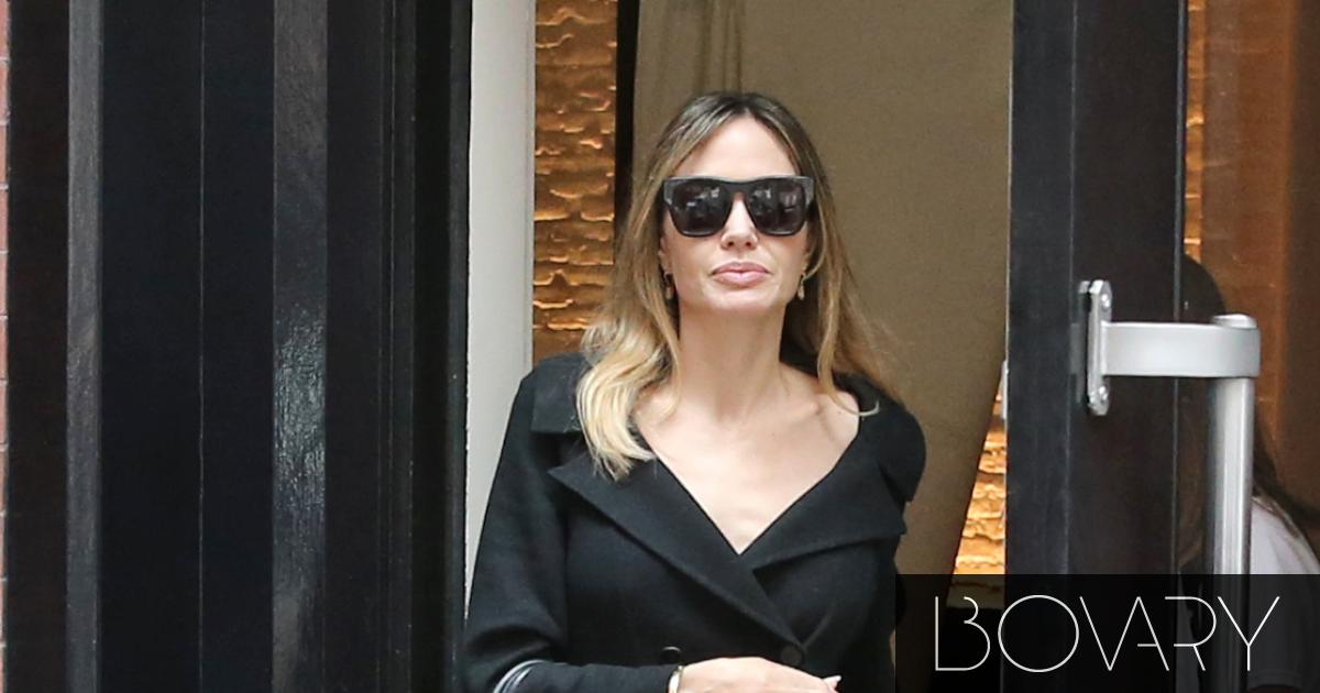 Angelina Jolie pairs chic flats with a pop of color that will impress this fall—the definition of understated luxury