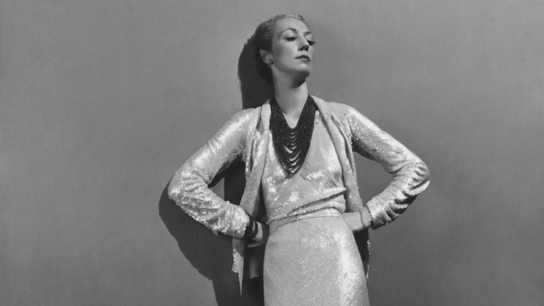 Roussy Sert wearing a long white sequin dress by Chanel, and a 15-strand coral necklace, Photograph by André Durst, published in Vogue December 15, 1936 Photograph: Andre Durst/Condé Nast/Shutterstock