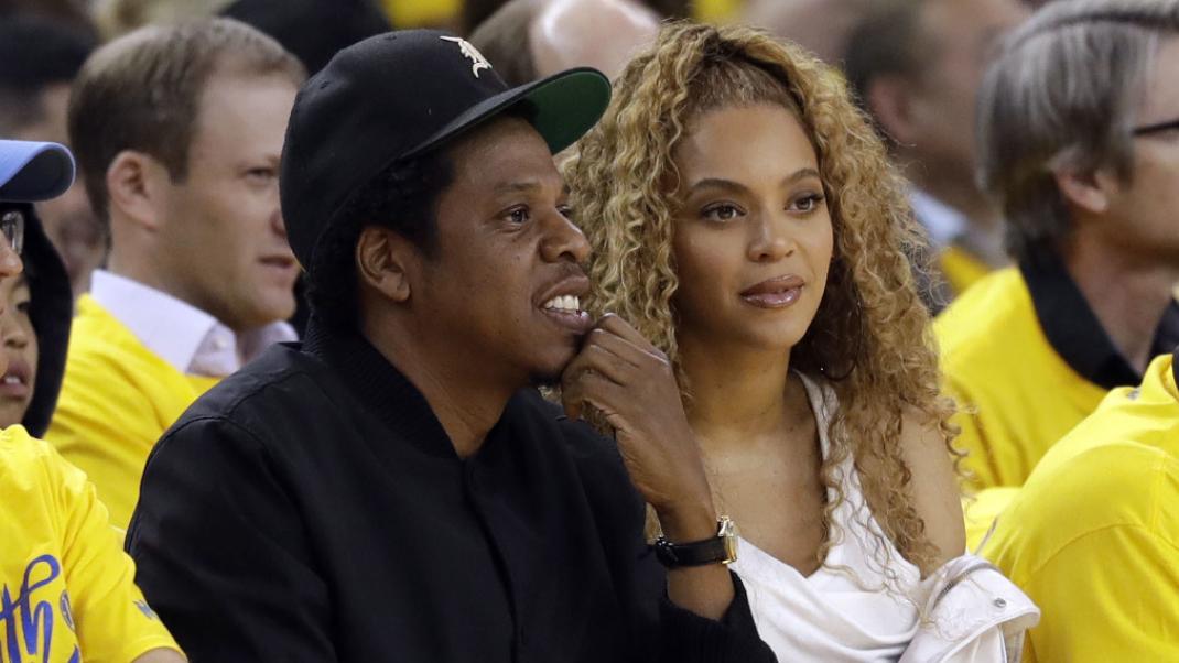 H Jay-Z και η Beyonce στο γήπεδο, Φωτογραφία: AP images/Marcio Jose Sanchez