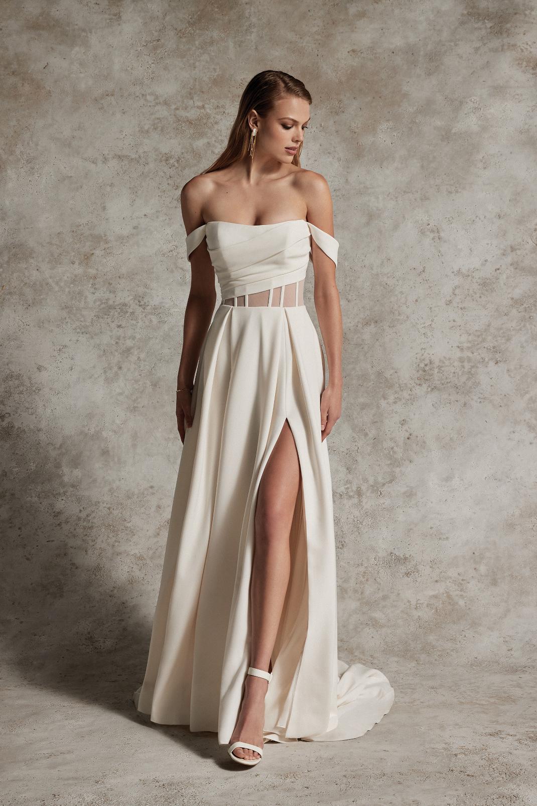 SAKI: CREPE A-LINE WEDDING GOWN WITH EXPOSED BONING AND SKIRT SLIT