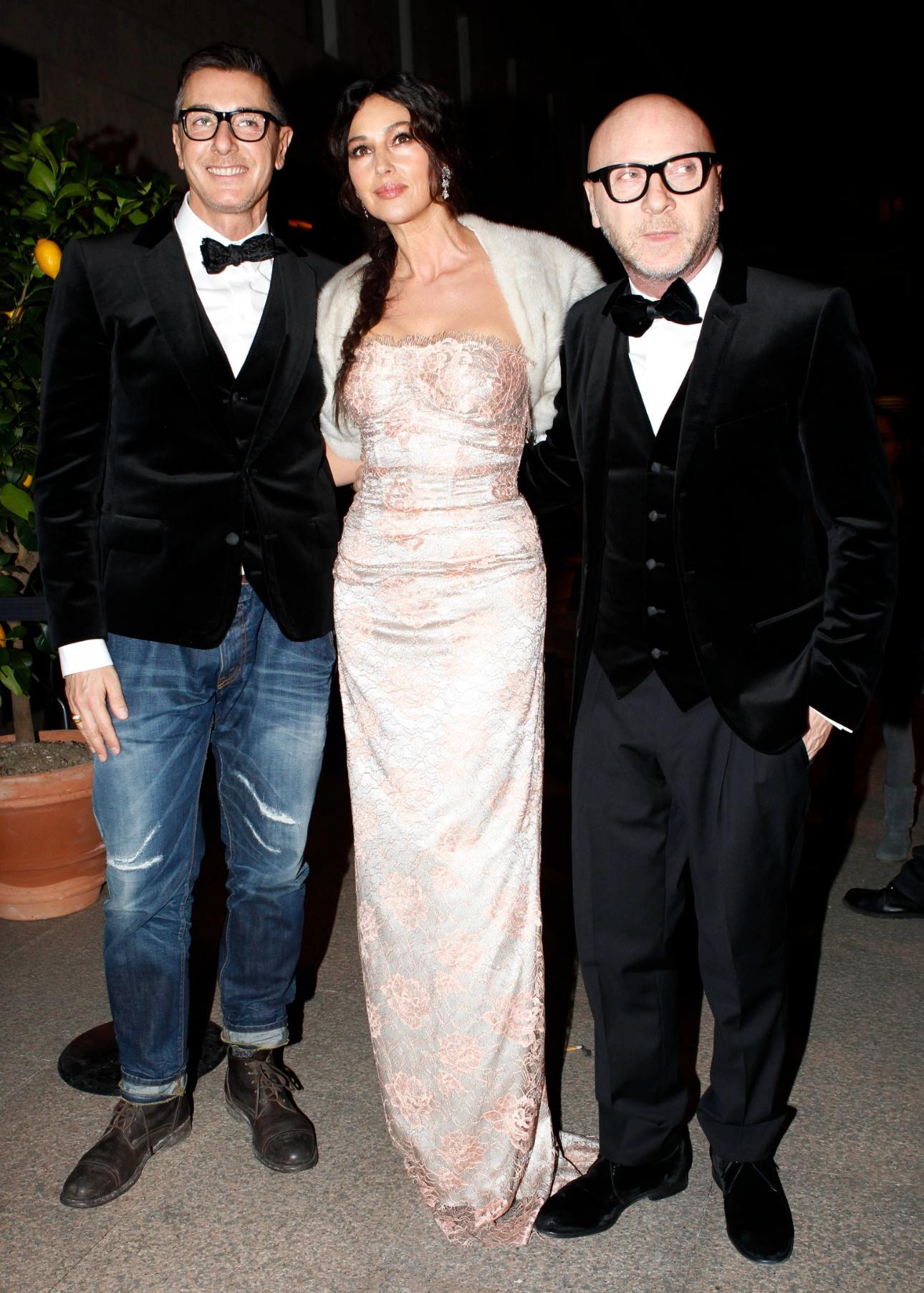 Stefano Gabbana, Monica Bellucci, Domenico Dolce/ AP Images