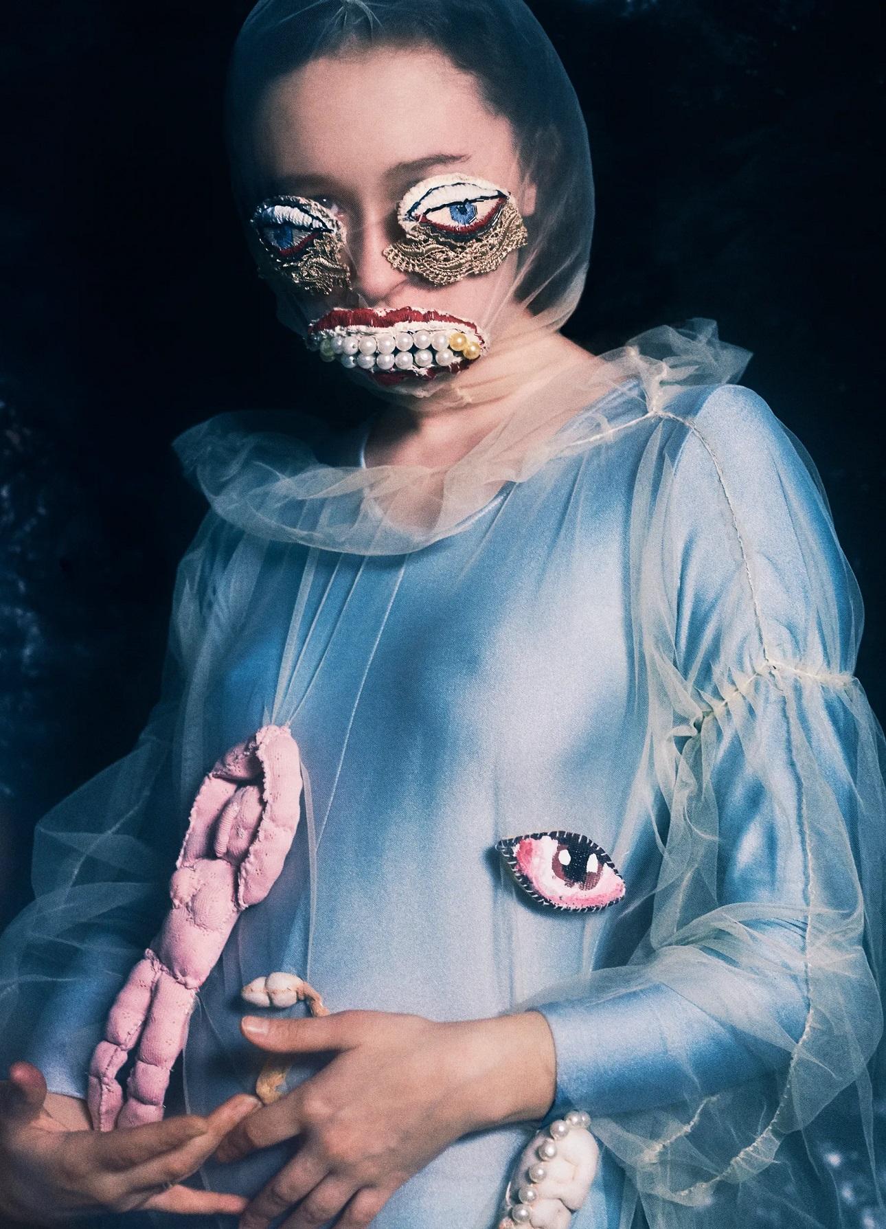 Artist Alisa Gorshenina wearing artificial eyes and a jeweled mouth. Photo by Photo by Elizaveta Porodina/Courtesy MFIT