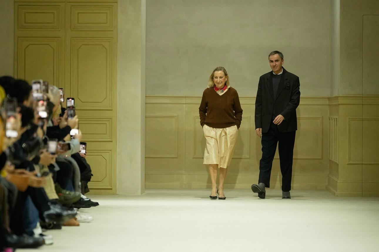 Miuccia Prada, Raf Simons/ AP Images