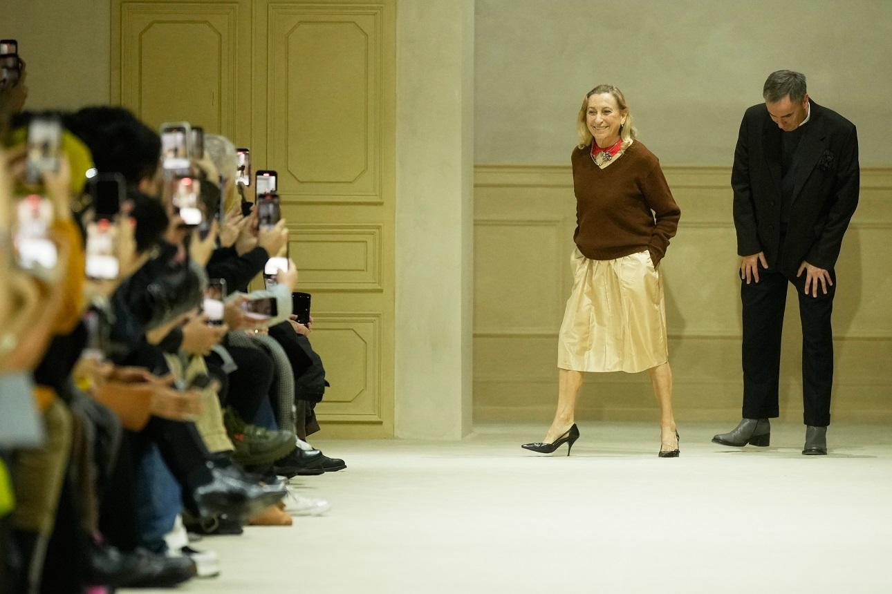 Miuccia Prada, Raf Simons/ AP Images