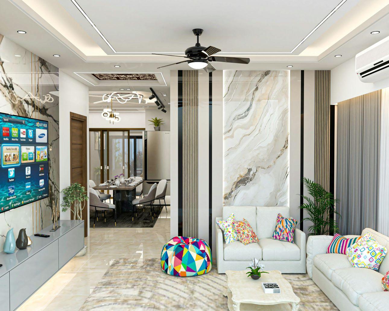 Ένα μικρό σαλόνι σε ουδέτερη παλέτα που φωτίζεται από χρωματιστές πινελιές σε έπιπλα και μαξιλάρια μοιάζει μεγαλύτερο/ Φωτογραφία: Unsplash