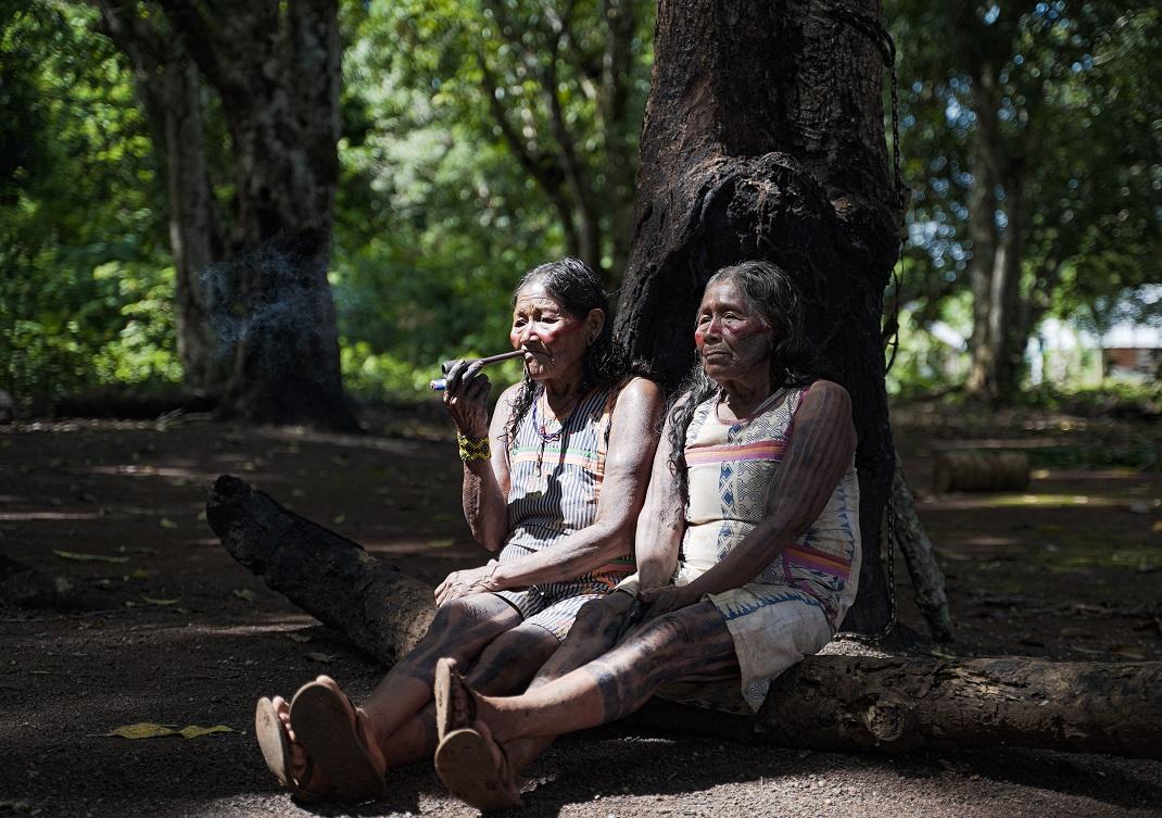 Kayapo women smoking, Amazon forest, Brazil